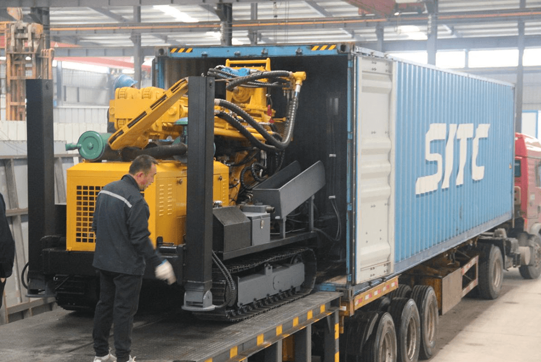 Drilling rig being professionally loaded into a shipping container